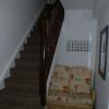 The entrance hall and stairs to the lounge at El Rincon. The entrance hall has a beautiful mosaic tiled floor.